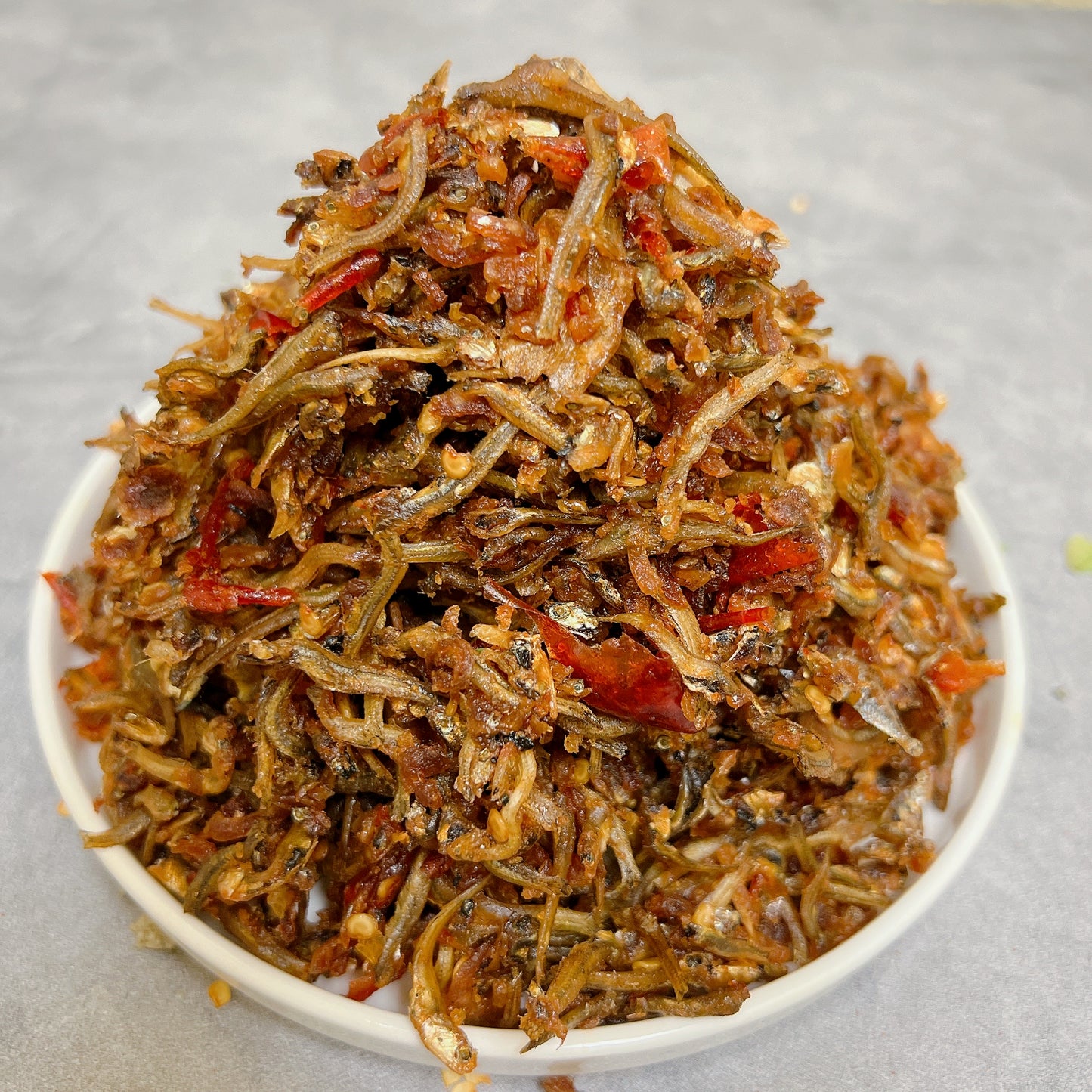 B05-Anchovy with spicy  garlic Sauce- Cá Cơm rang tỏi ớt.