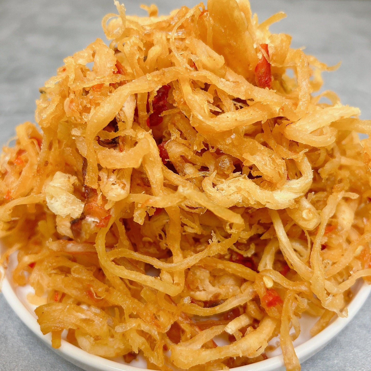 B26-Spicy Dried Squid Strips Garlic Butter -Khô Mực Sợi Rim Bơ Tỏi Ớt Cay Ít.